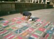 man drawing on floor