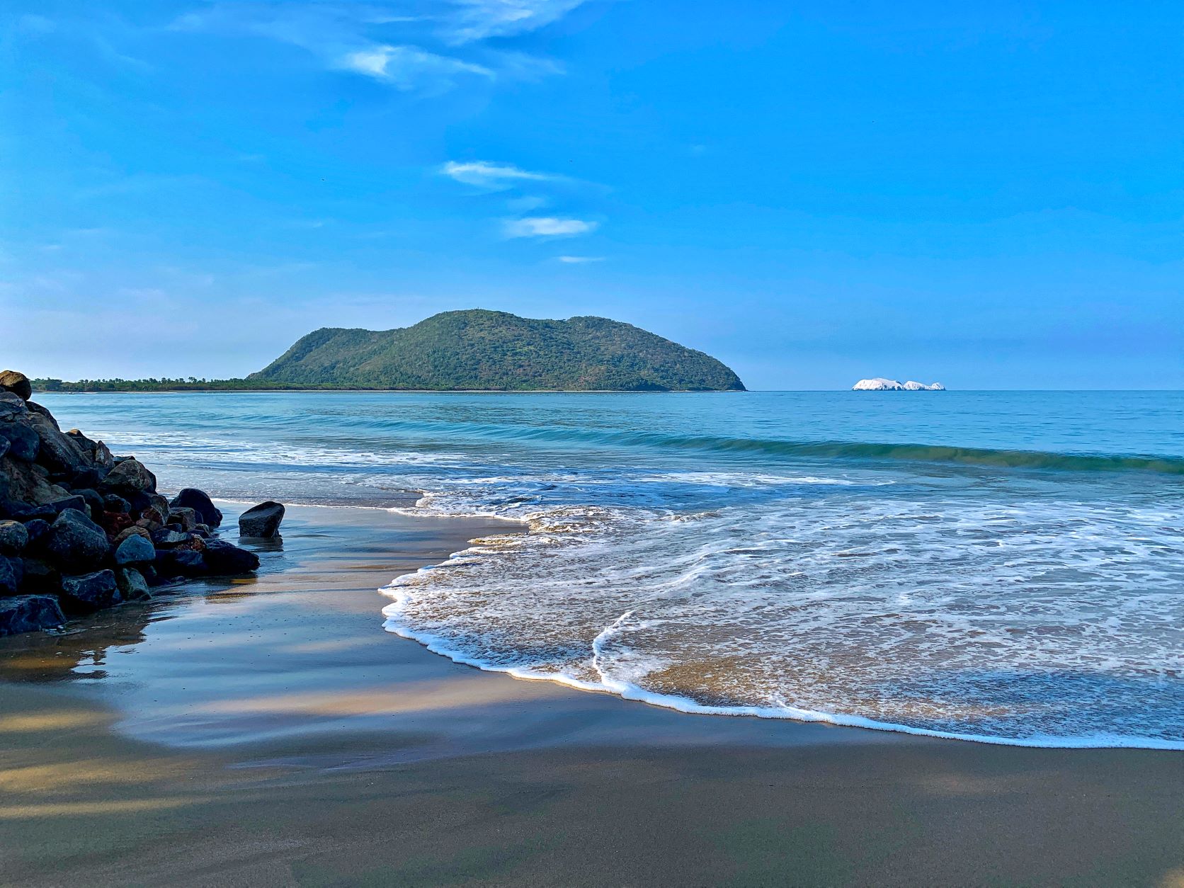 The ocean with an island in the background